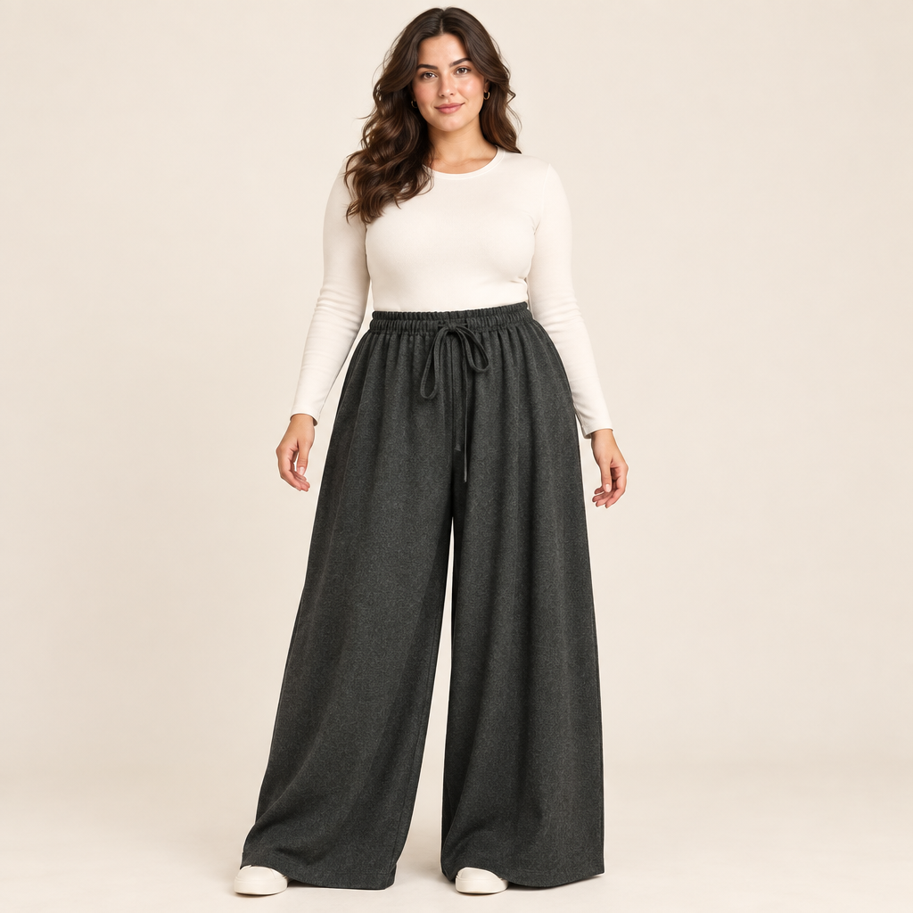 Modella curvy con pantaloni oversize grigio antracite